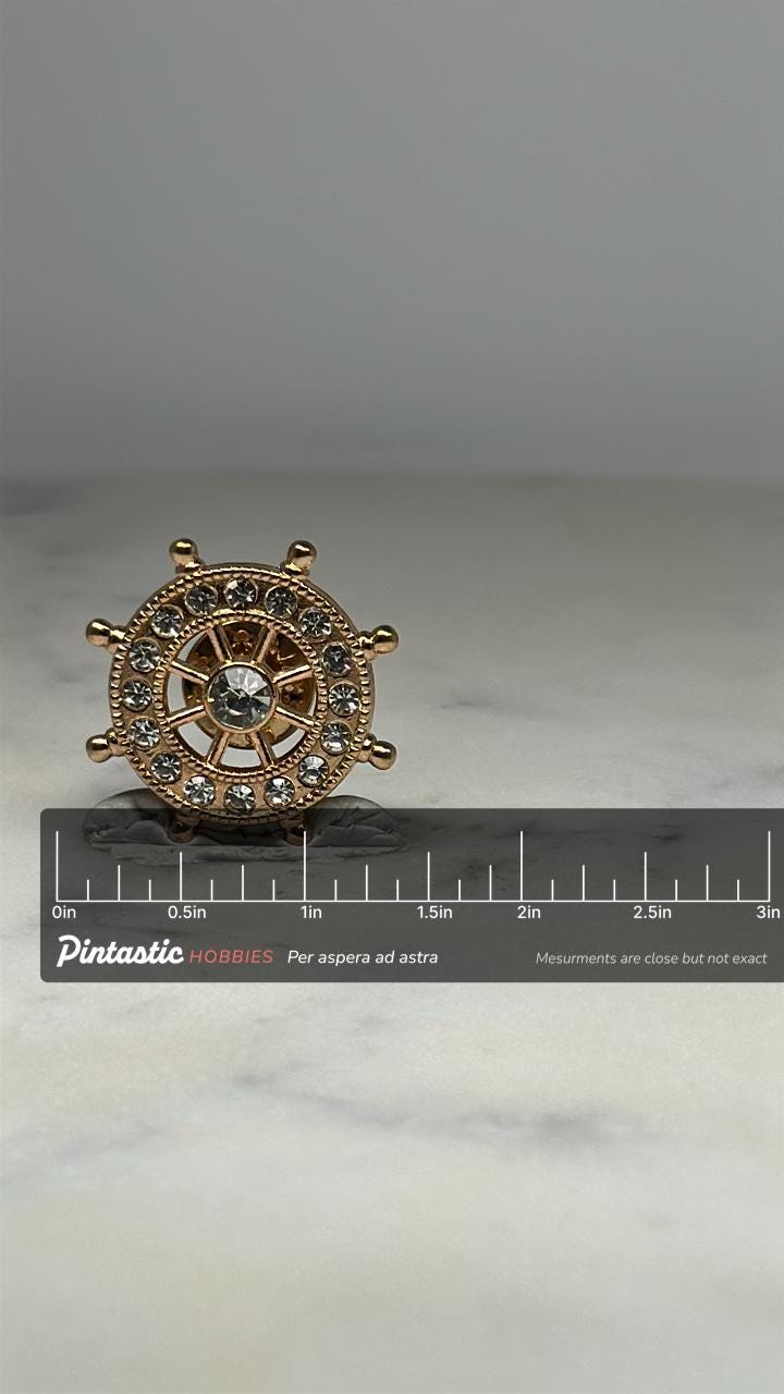 Nautical Ship Wheel Pin: Gold Tone with Rhinestones - Vintage-Inspired Accessory with ruler overlay for size reference