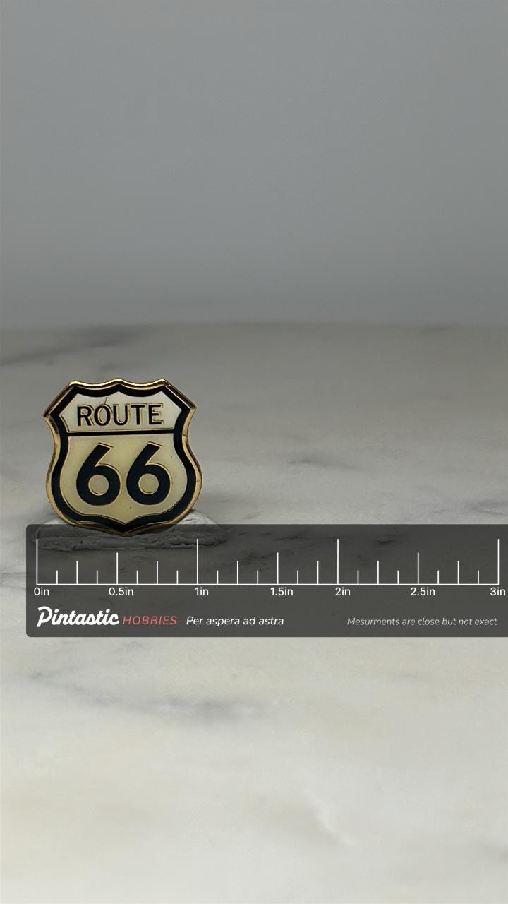 Route 66 Highway Pin: Black & Gold Enamel - Vintage Travel Accessory with ruler overlay for size reference