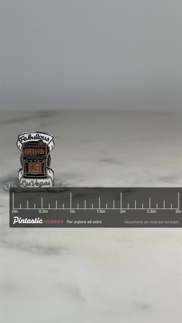 Las Vegas Slot Machine Pin: Silver Enamel - Retro Souvenir Accessory with ruler overlay for size reference