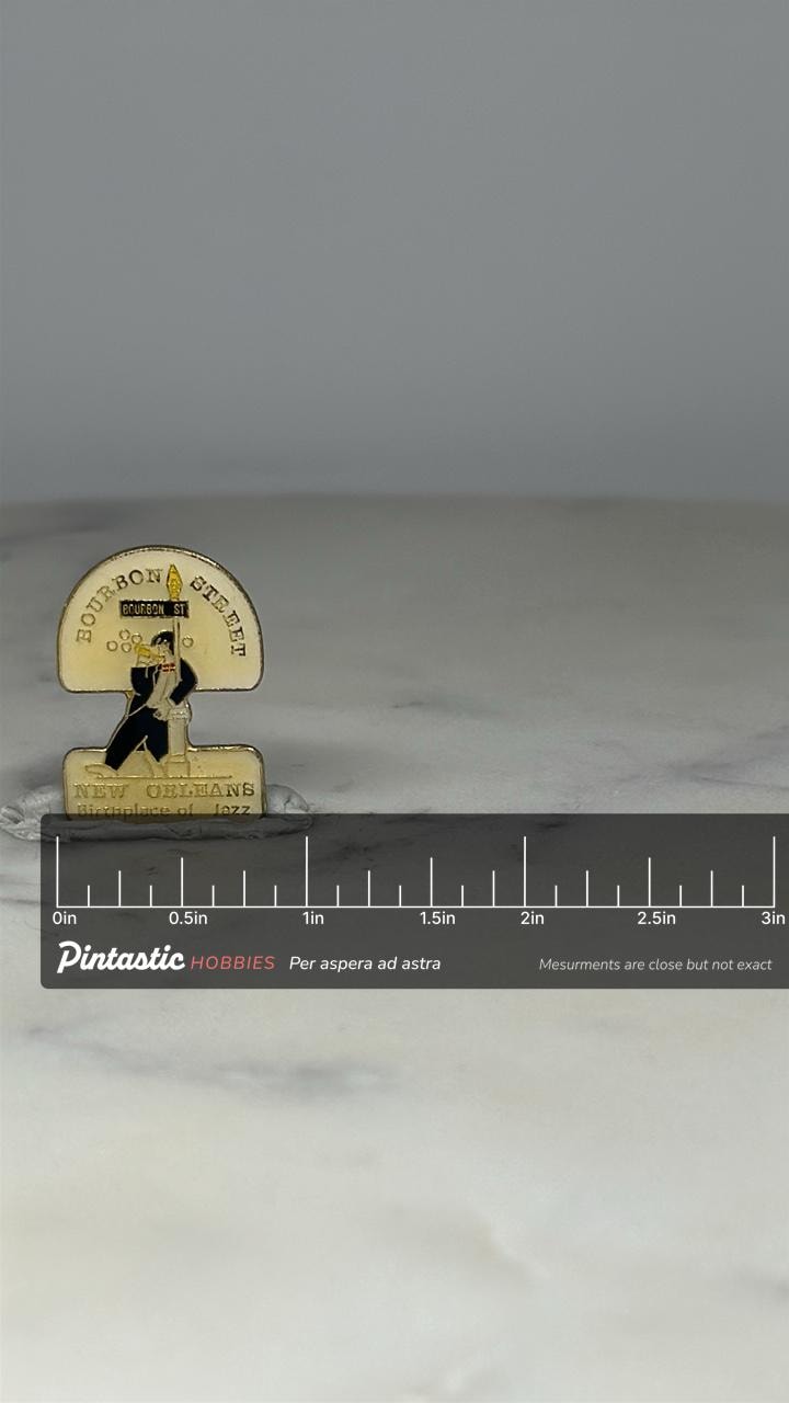 New Orleans Jazz Lapel Pin: Enamel Gold-Tone - Bourbon Street Accessory with ruler overlay for size reference