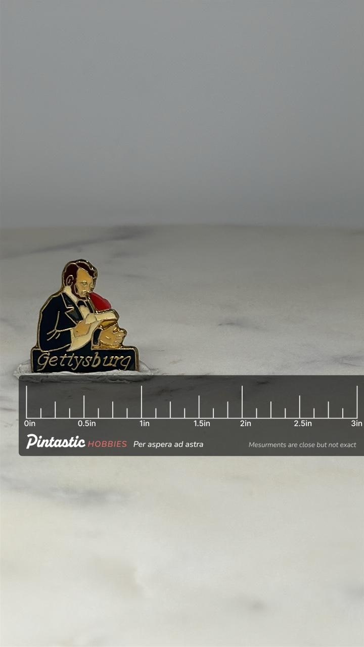 Gettysburg Souvenir Pin: Gold Enamel Finish - Historical Accessory with ruler overlay for size reference