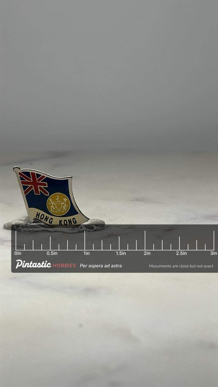 Hong Kong Flag Pin: Enamel Metal Finish - Colonial Era Accessory with ruler overlay for size reference