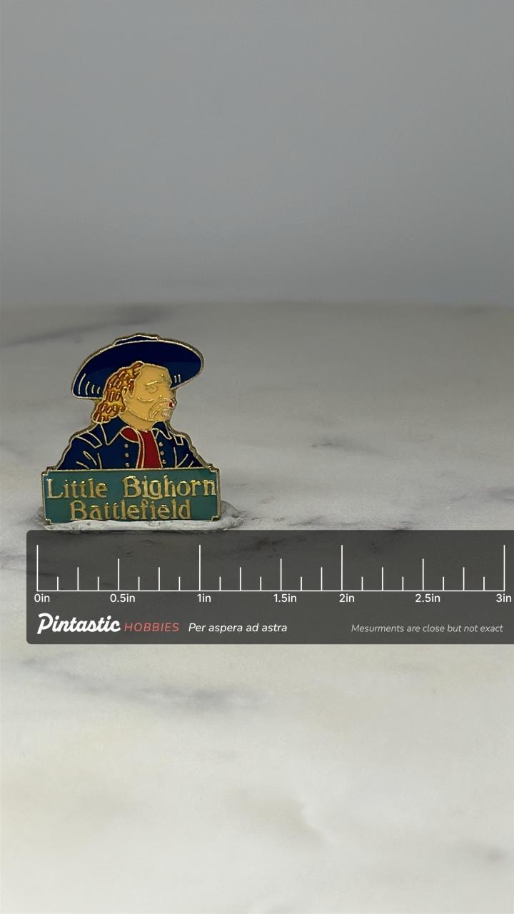 Little Bighorn Battlefield Souvenir Pin: Enamel Gold-Tone - Historical Accessory with ruler overlay for size reference