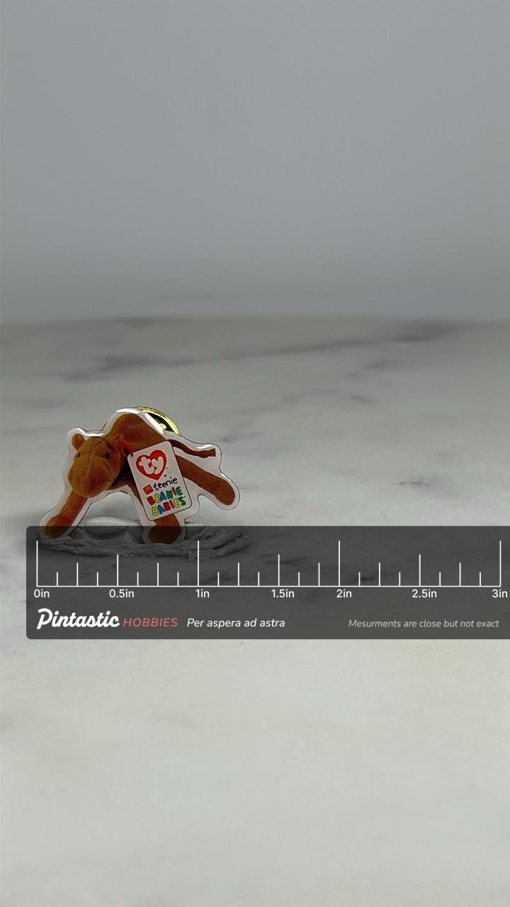 Beanie Babies Camel Pin: Matte Photo Style - 90s Toy Accessory with ruler overlay for size reference
