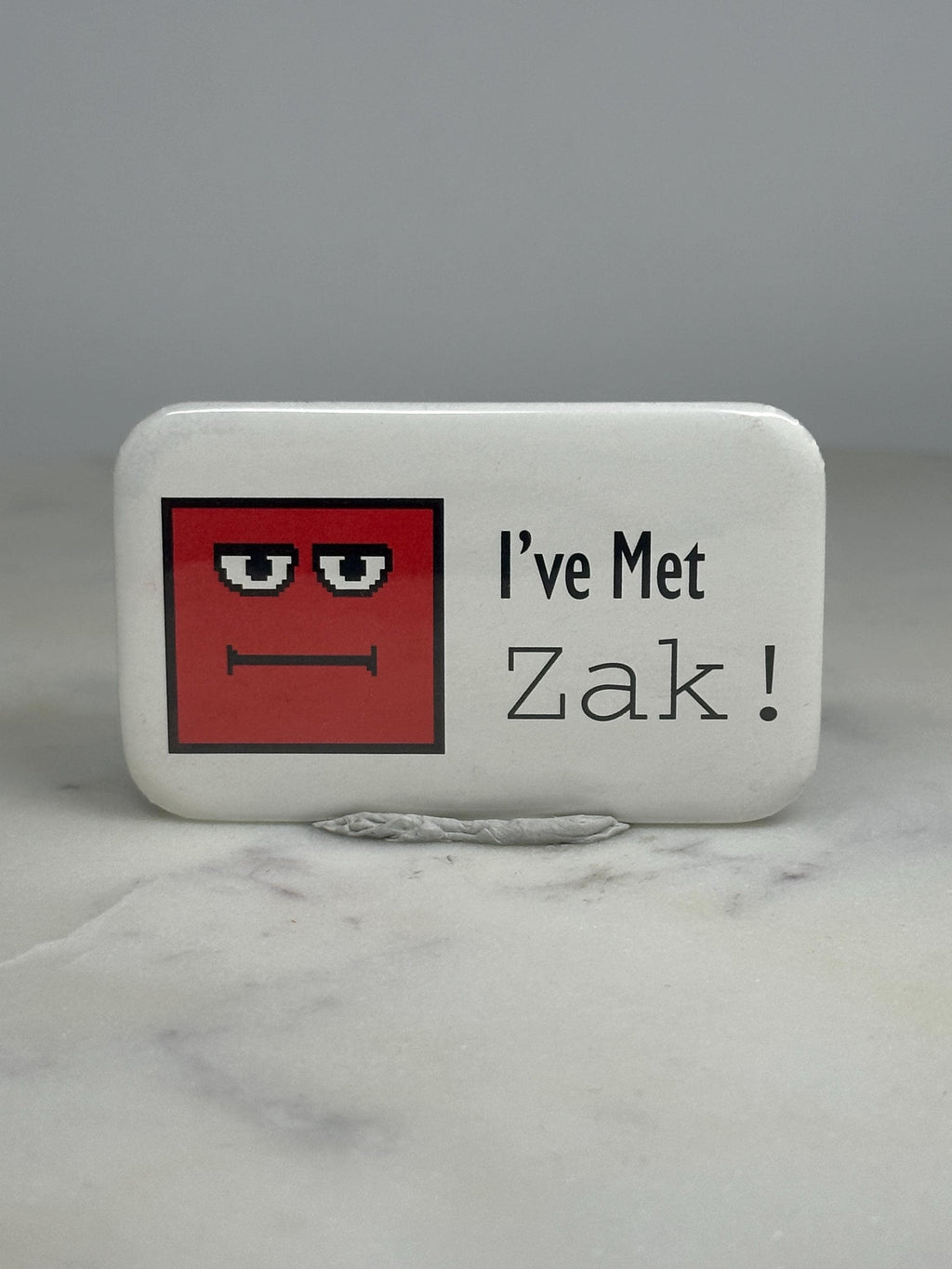 Zak Character Pin: Red Pixel Art Face - Retro Collectible Accessory