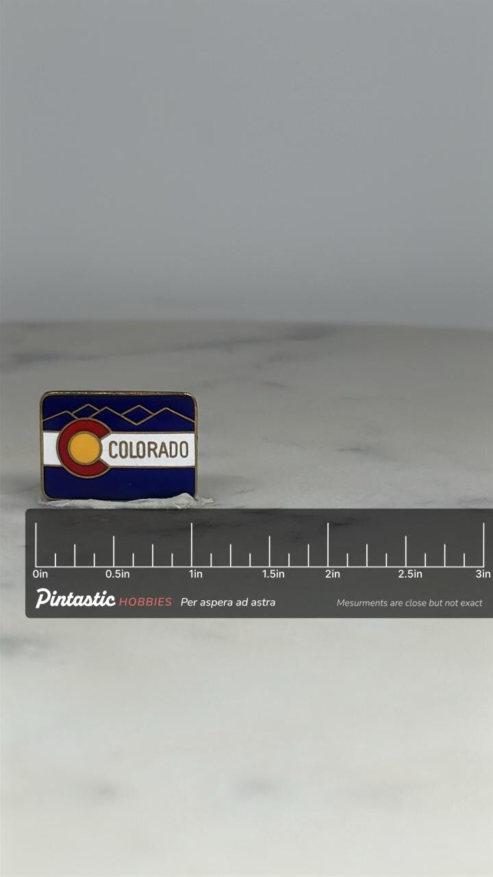 Colorado Flag Enamel Pin: Red White Blue - Vintage Souvenir Accessory with ruler overlay for size reference