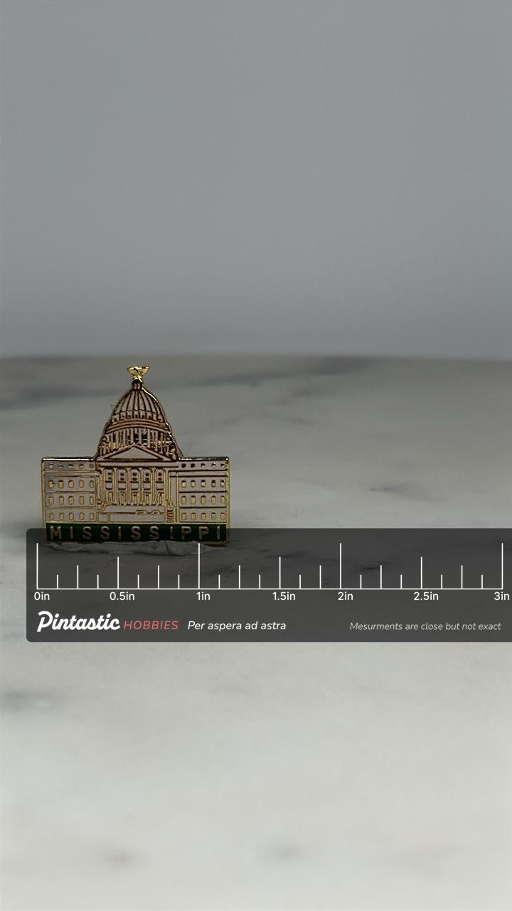 Mississippi Capitol Building Pin: Gold & Enamel - Vintage Souvenir Accessory with ruler overlay for size reference