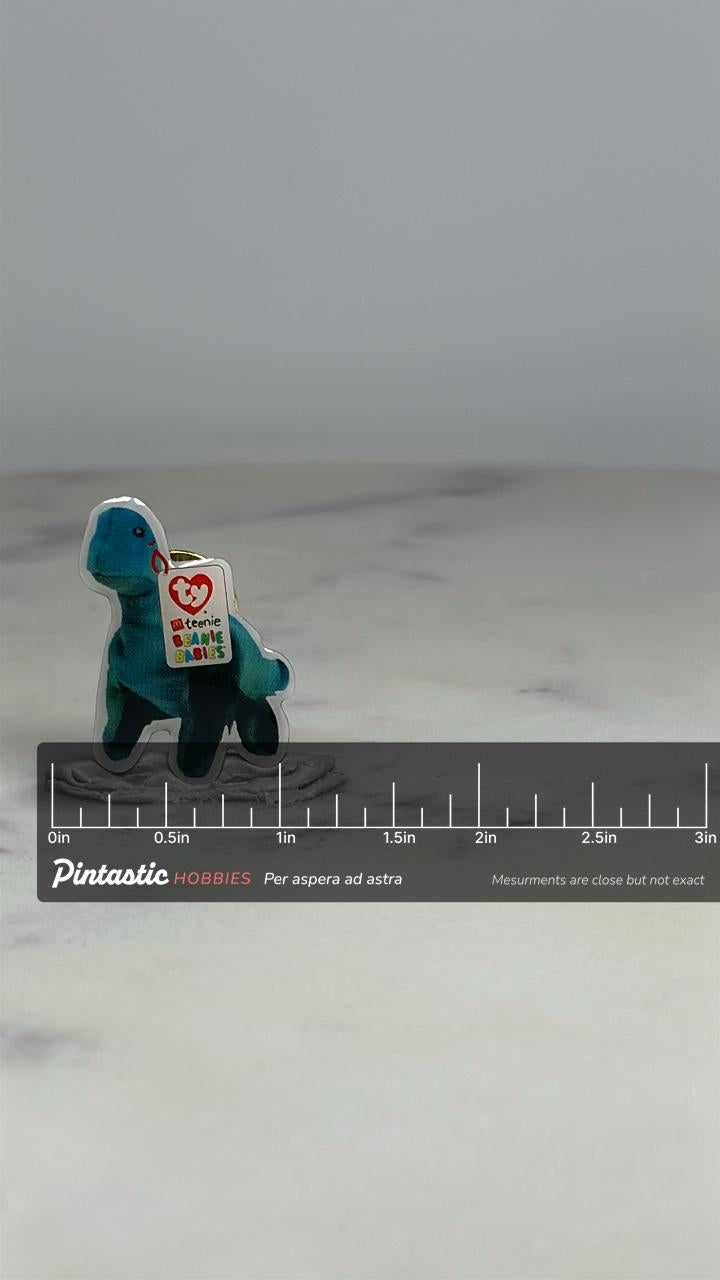 Beanie Baby Dinosaur Pin: Blue Color - 90s Collectible Accessory with ruler overlay for size reference