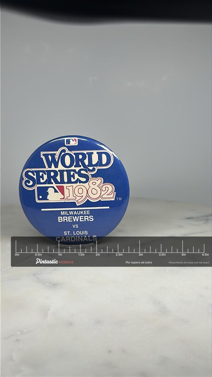 1982 World Series Button Pin: Blue & White - MLB Vintage Accessory with ruler overlay for size reference