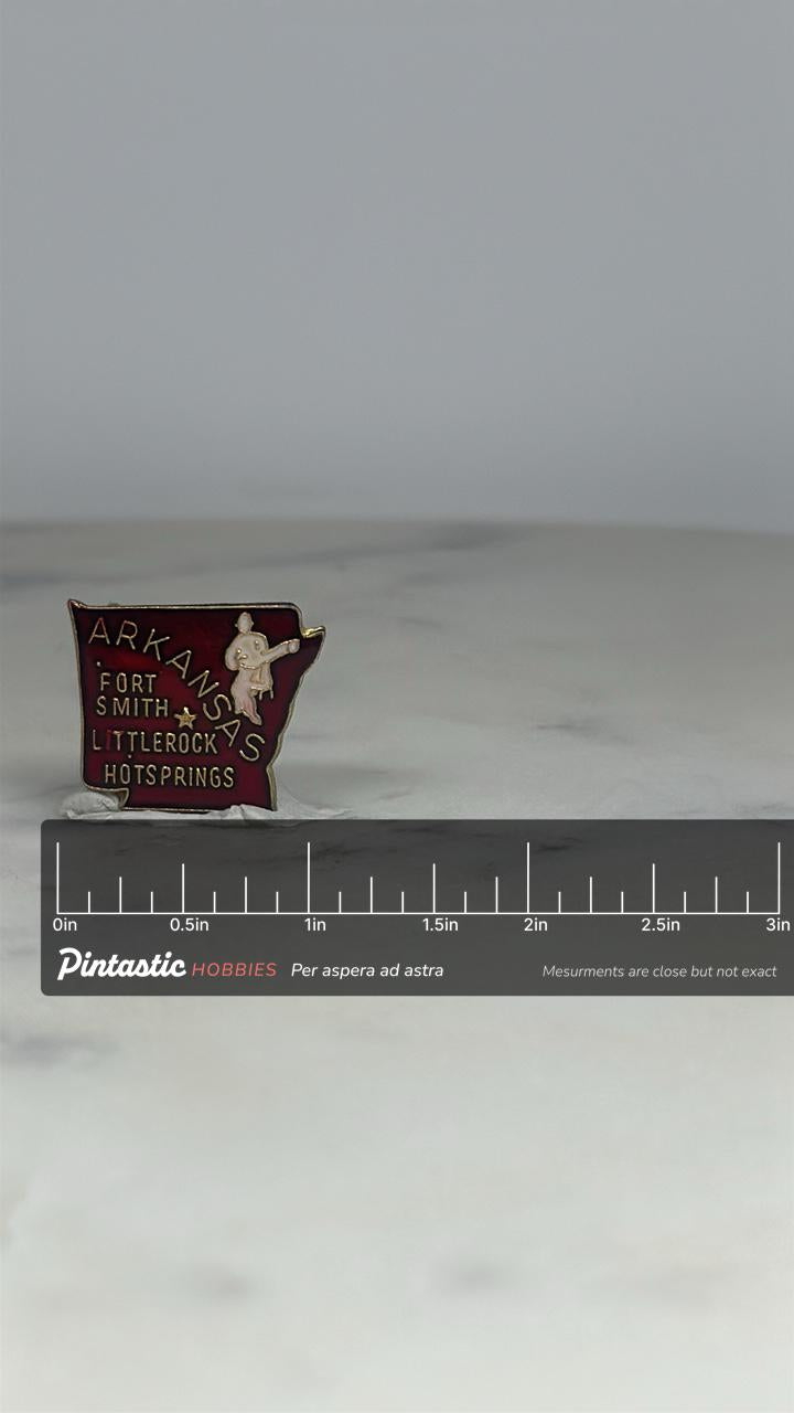 Arkansas State Souvenir Pin: Red Enamel Map - Vintage Travel Accessory with ruler overlay for size reference