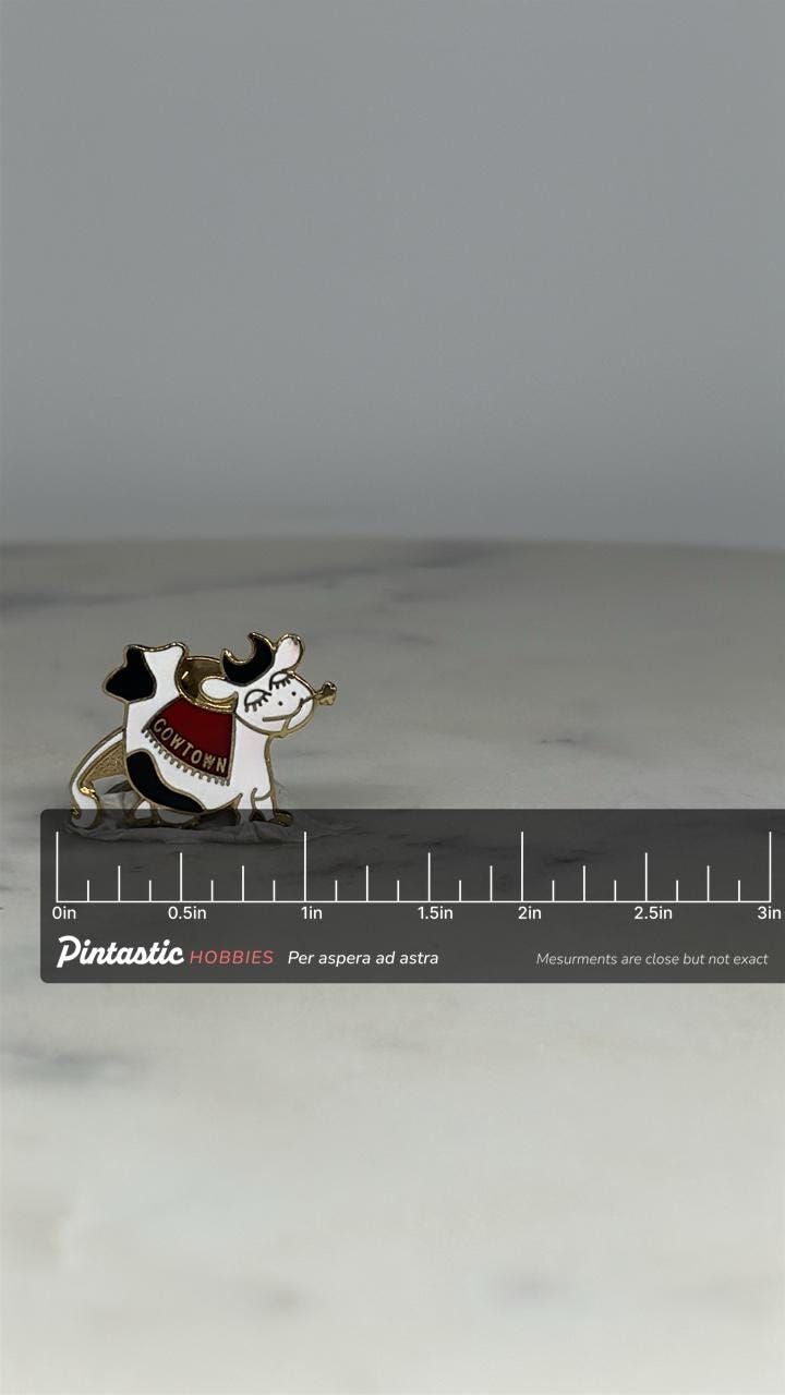 Cowtown Cow Pin: Enamel Gold-Tone - Whimsical Retro Accessory with ruler overlay for size reference
