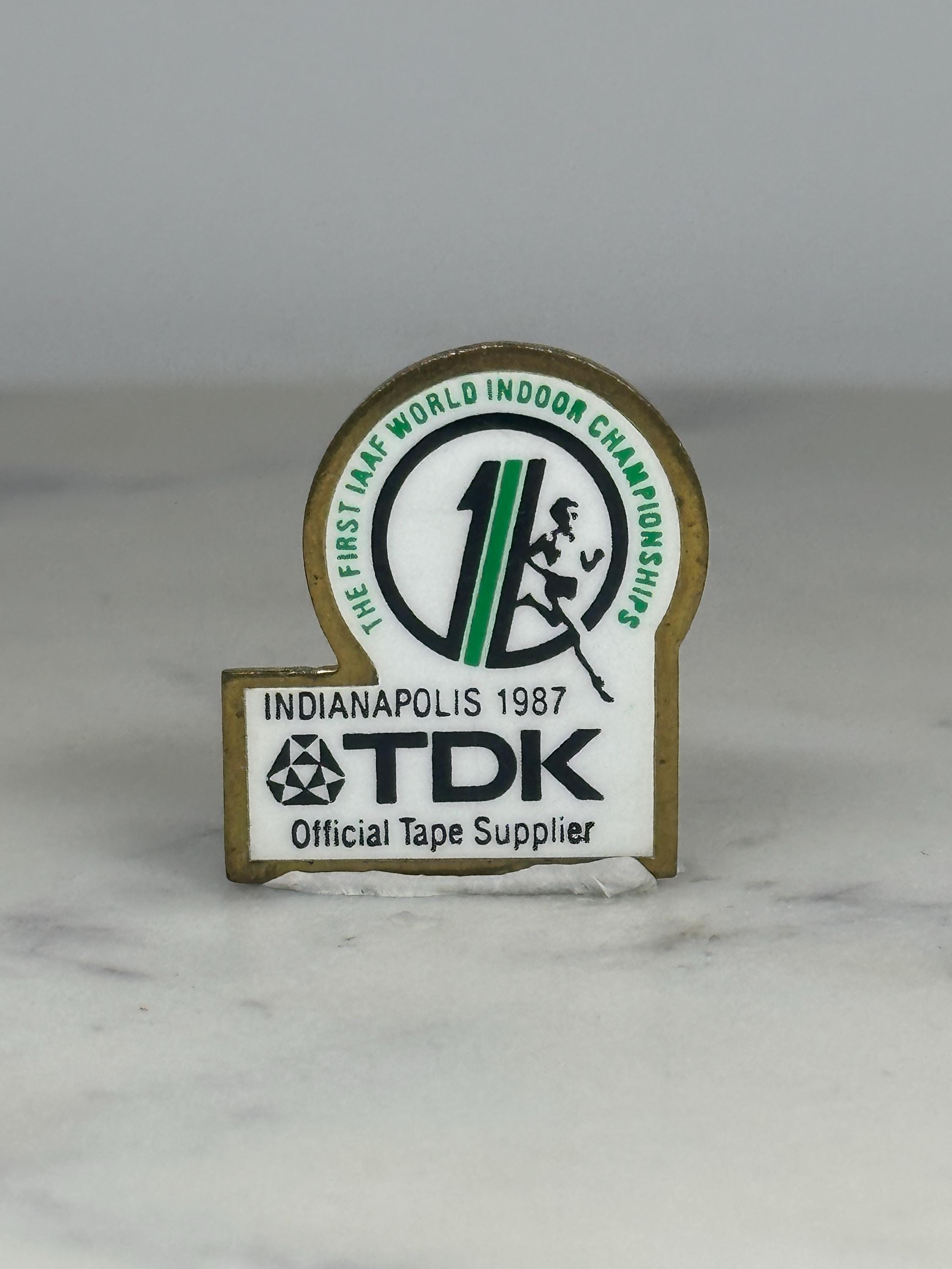 IAAF 1987 TDK Lapel Pin: White Brass Enamel - Track & Field Accessory