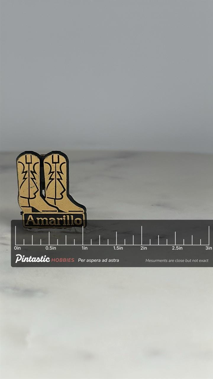 Amarillo Cowboy Boots Pin: Gold & Black Enamel - Vintage Texas Accessory with ruler overlay for size reference