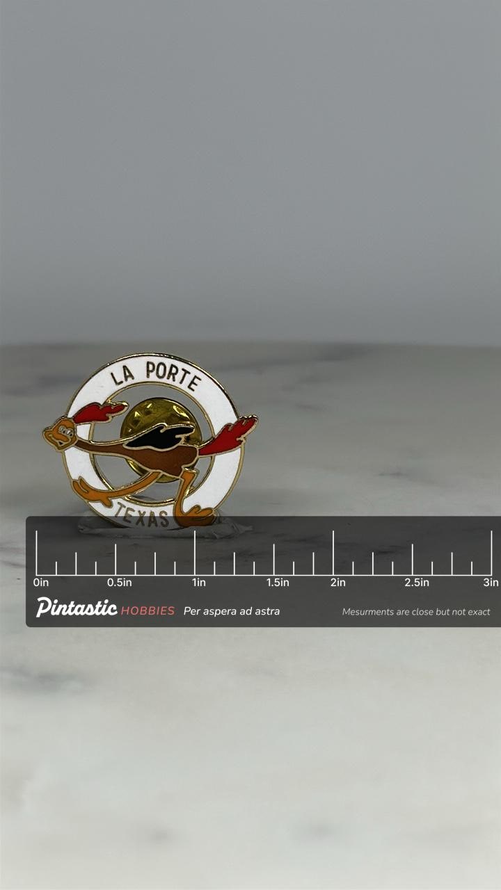 La Porte Texas Roadrunner Pin: Enamel Gold Tone - Vintage Souvenir Accessory with ruler overlay for size reference