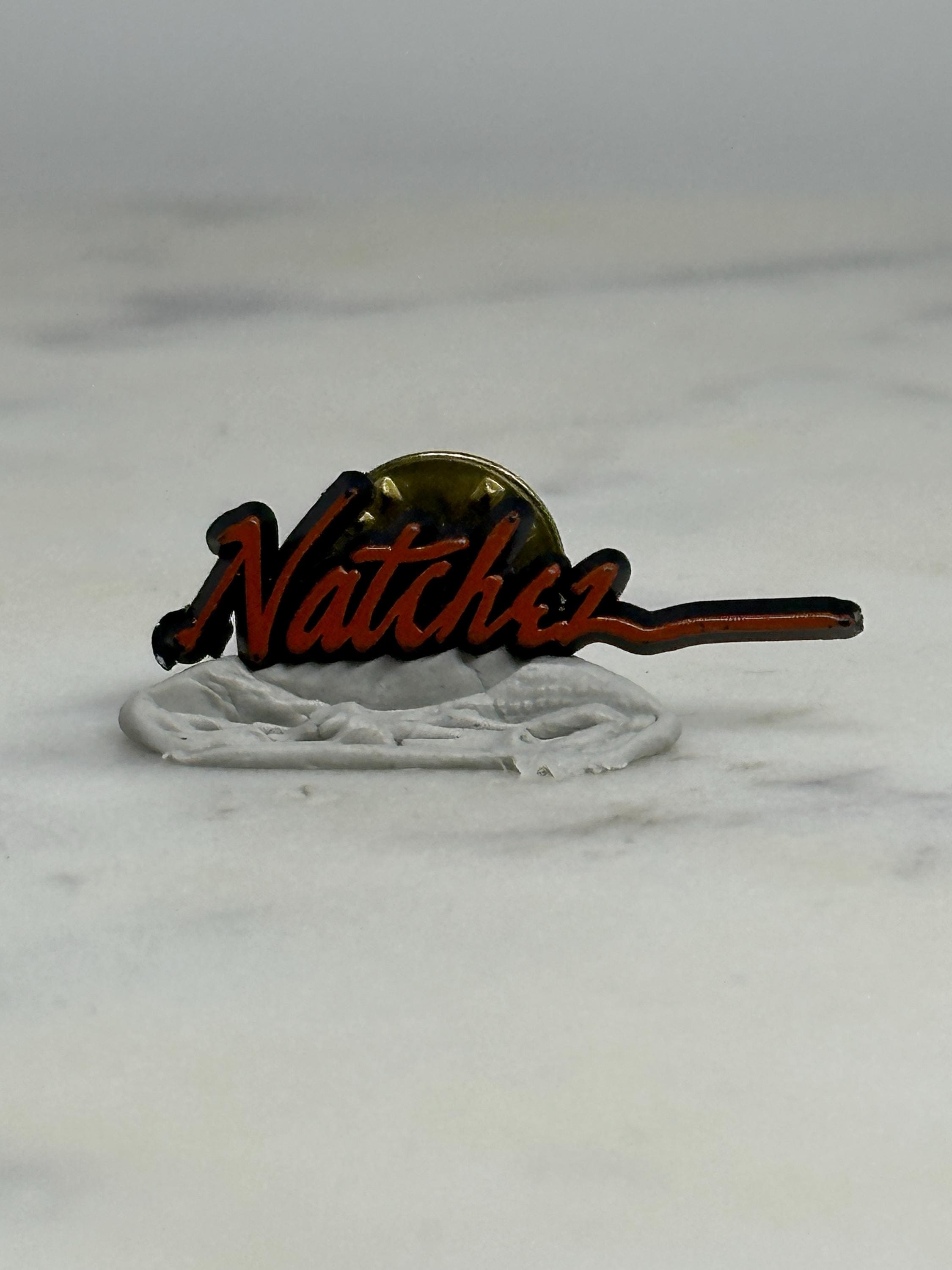 Natchez Souvenir Pin: Red Script with Sunset - Vintage Travel Accessory