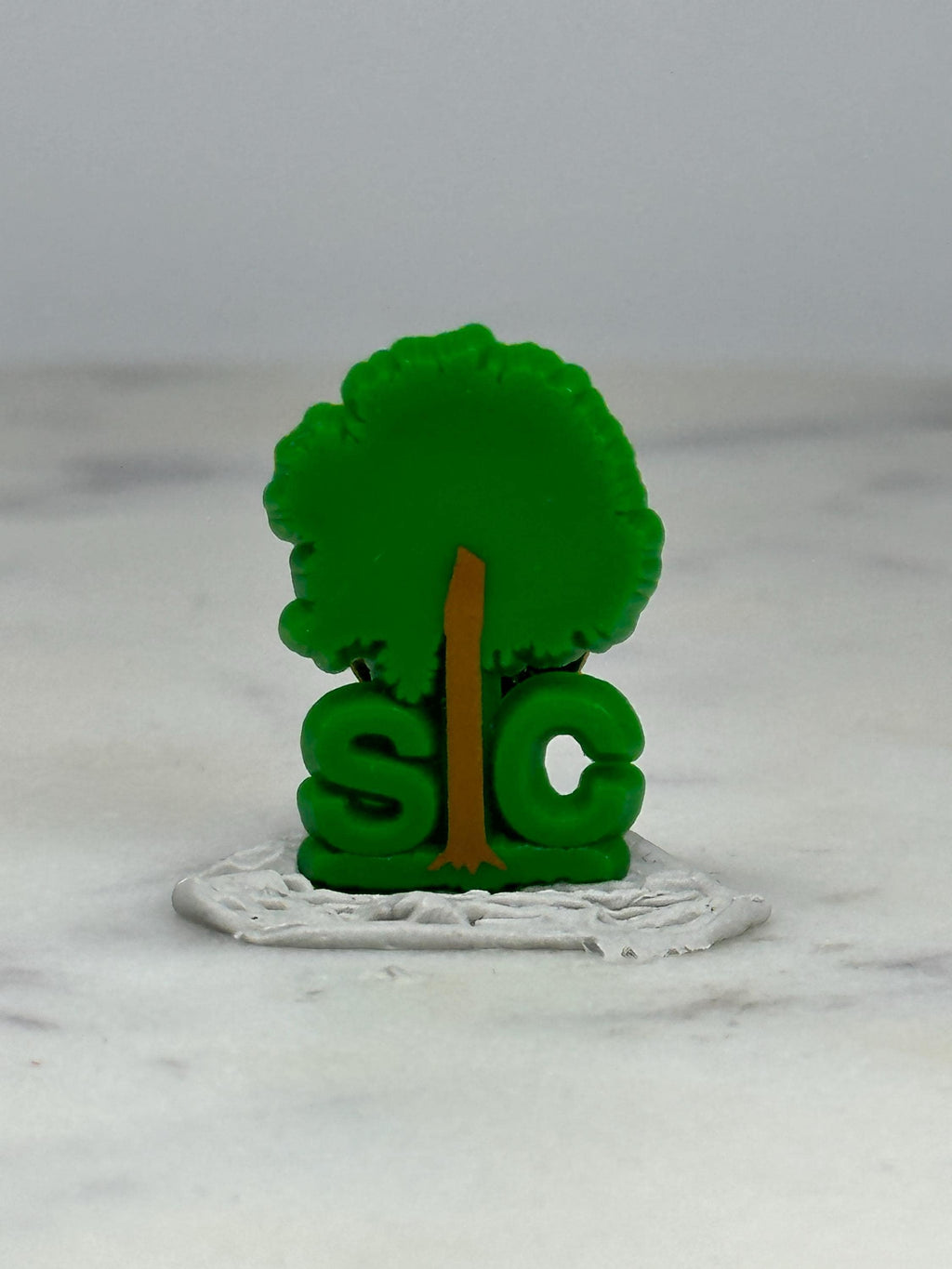 SIC Tree Logo Pin: Green Plastic Finish - Vintage Nature Accessory