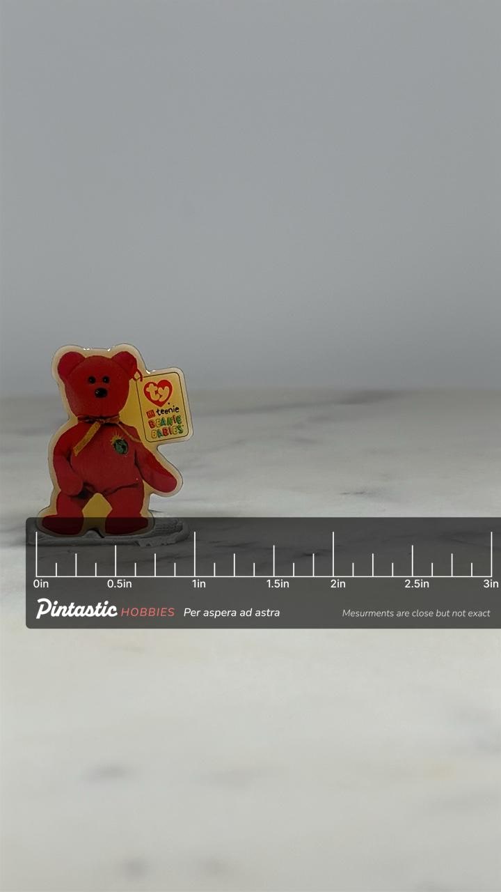 Beanie Babies Millennium Globe Bear Pin: Red Plastic - 90s Nostalgia Accessory with ruler overlay for size reference
