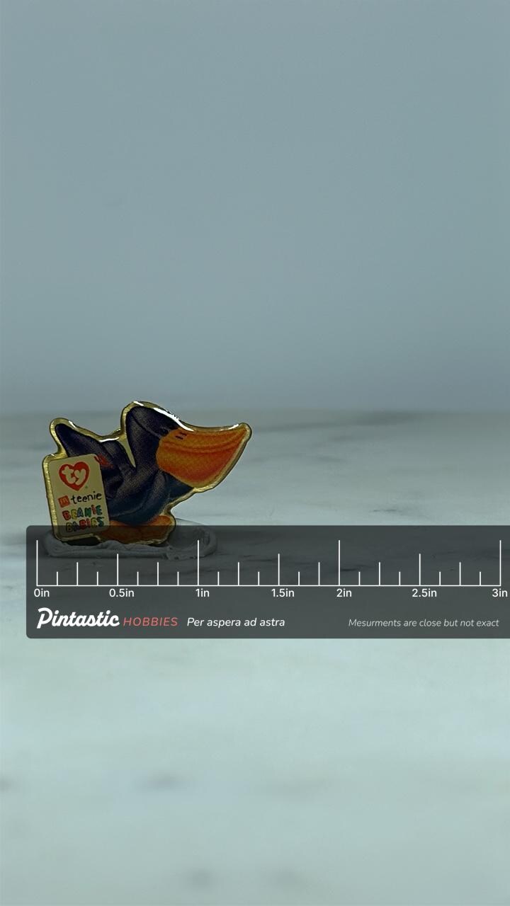 Beanie Babies Pin: Black Duck with TY Tag - 90s Collectible Accessory with ruler overlay for size reference