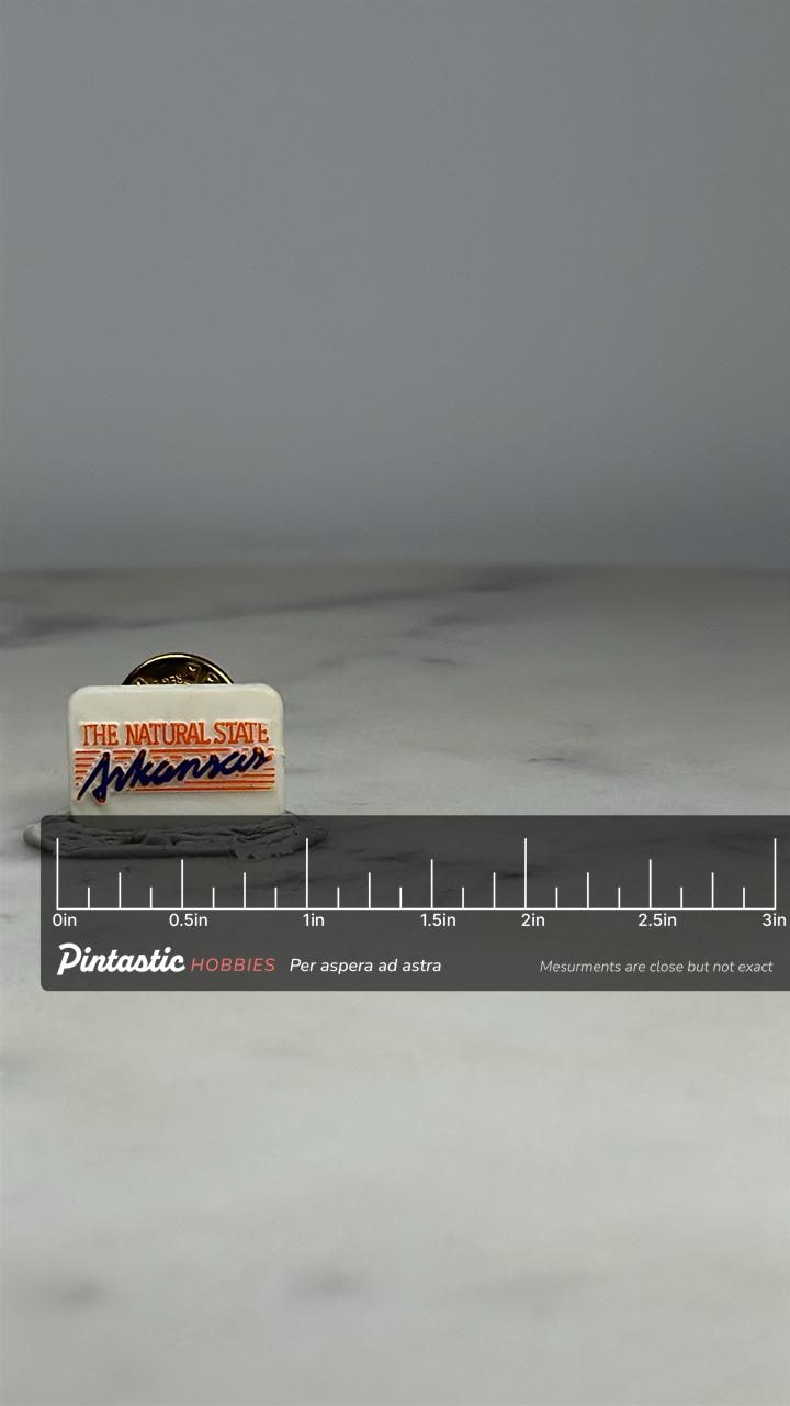 Arkansas State Souvenir Pin: White Enamel - Retro Travel Accessory with ruler overlay for size reference