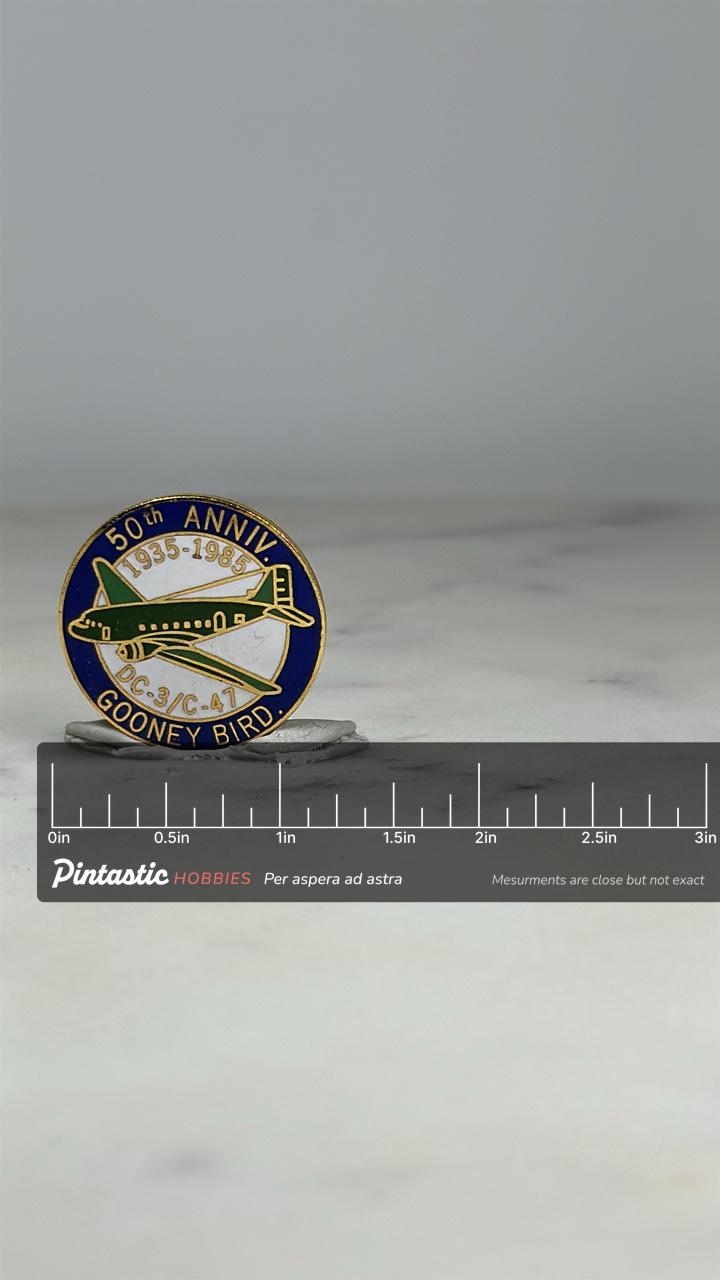 DC-3 C-47 Gooney Bird Pin: Enamel Blue-Green - 1985 Aviation Accessory with ruler overlay for size reference