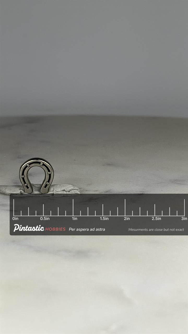 Horseshoe Lapel Pin: Silver Tone Metal - Western Rodeo Accessory with ruler overlay for size reference