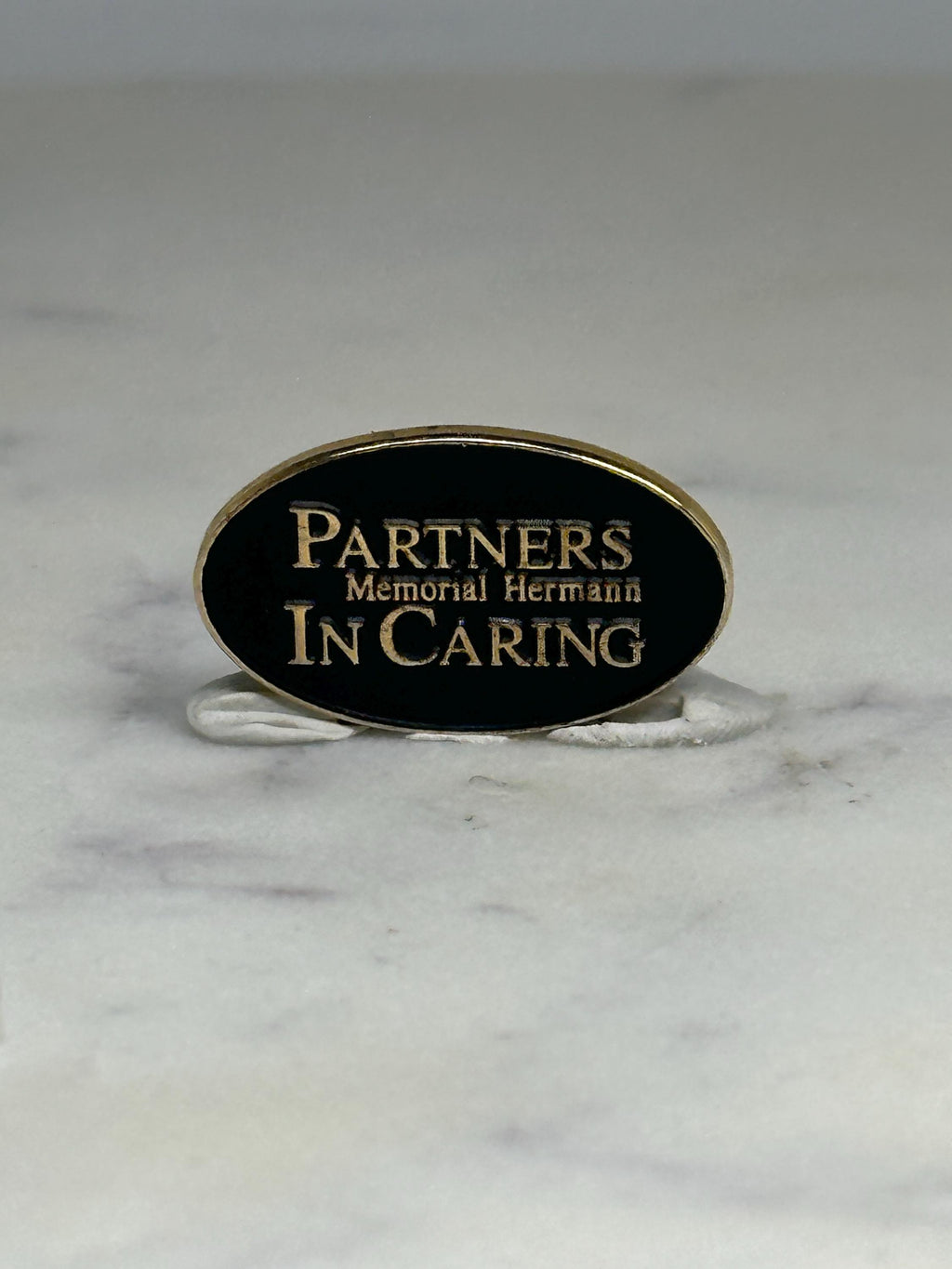 Memorial Hermann Partners in Caring Pin: Black Gold Oval - Healthcare Tribute Accessory