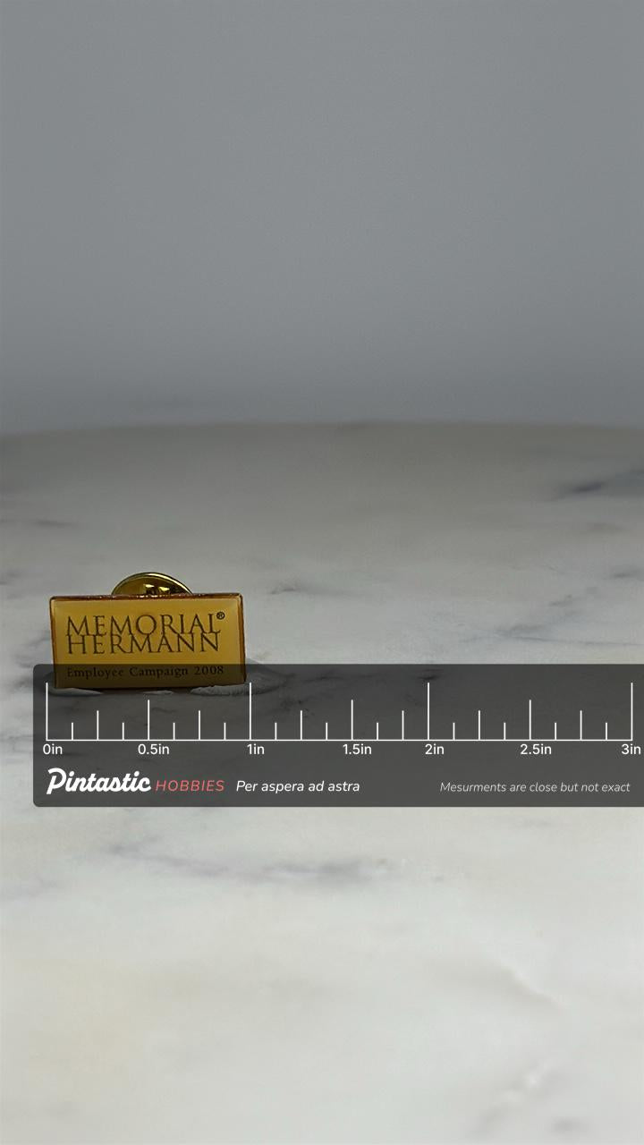 Memorial Hermann Employee Pin: Gold Tone Rectangle - 2008 Career Accessory with ruler overlay for size reference