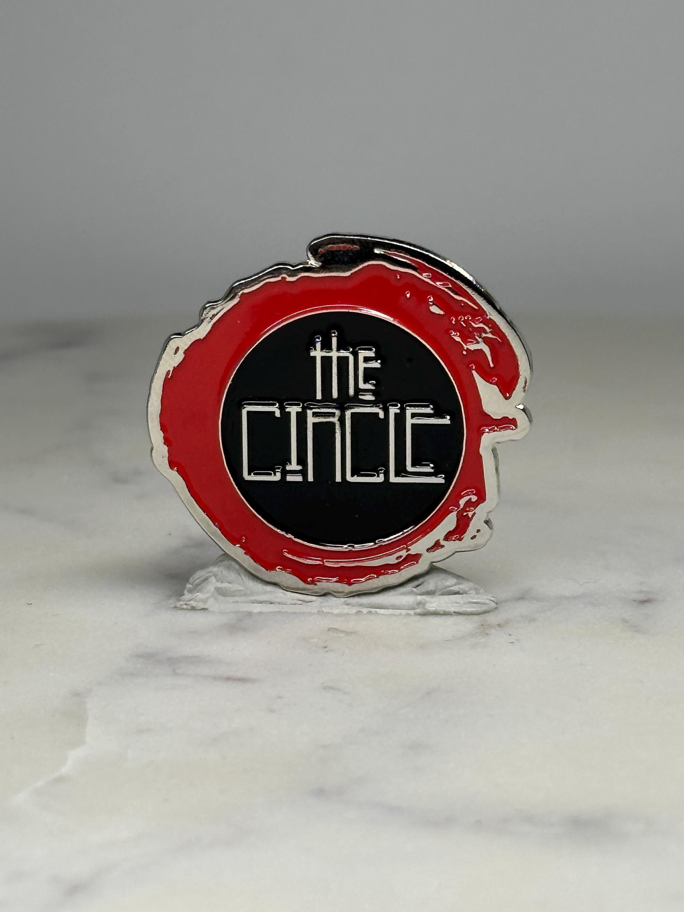 The Circle Rock Band Enamel Pin: Red & Black Metal - Pop Culture Accessory