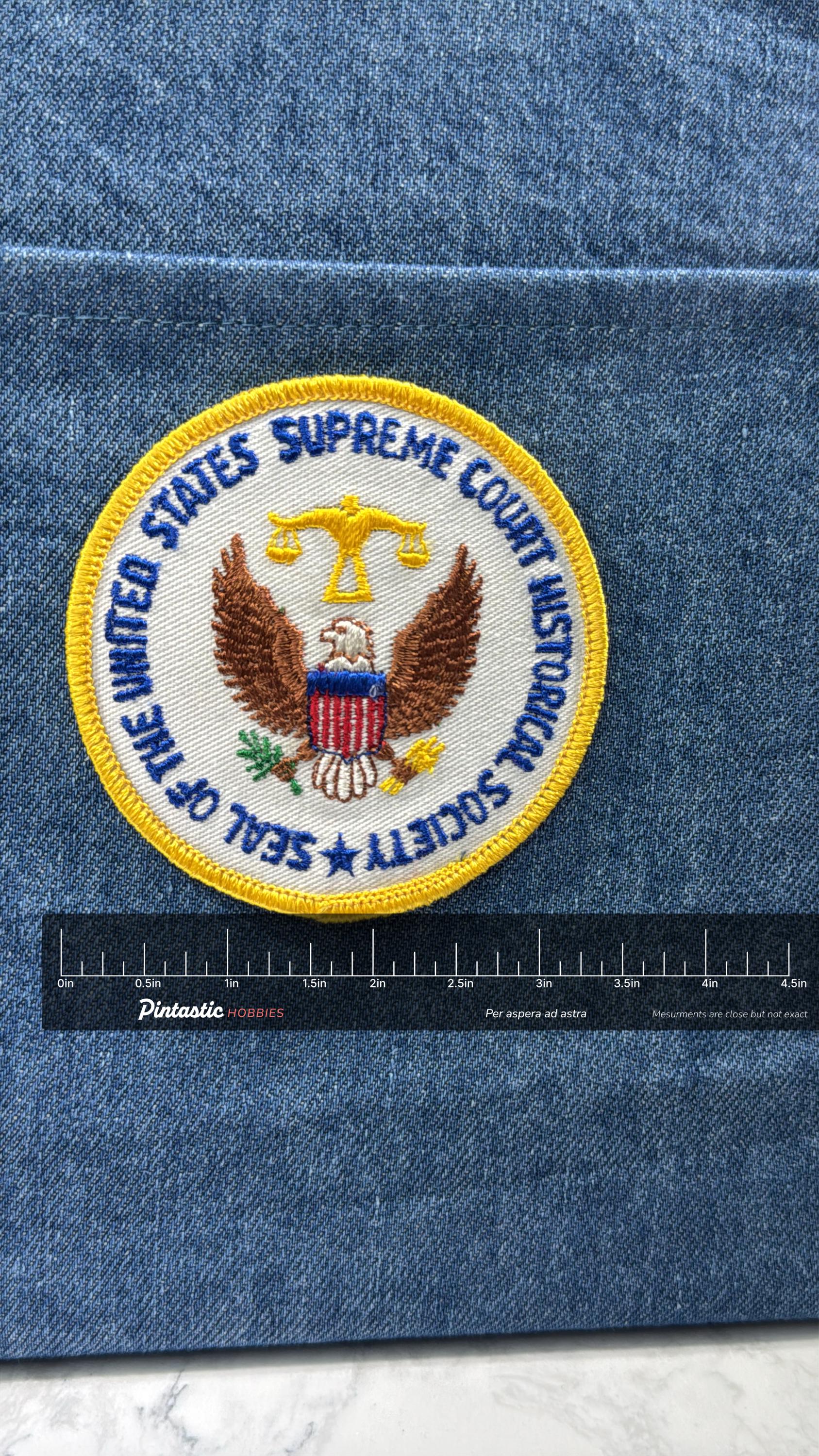 Supreme Court Historical Society Patch: Iron-On White/Gold Round - Government Accessory with ruler overlay for size reference