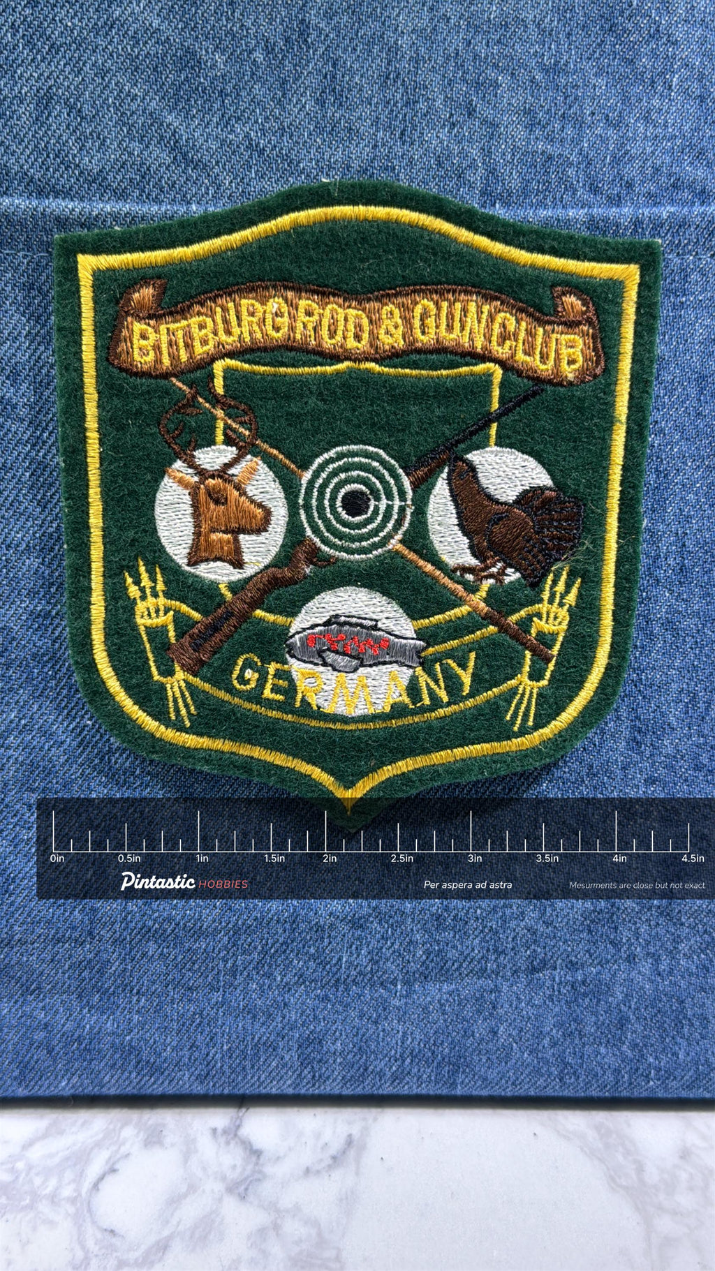 Bitburg Rod & Gun Club Collectable Patch: Sew-On Green Shield - Germany Accessory with ruler overlay for size reference