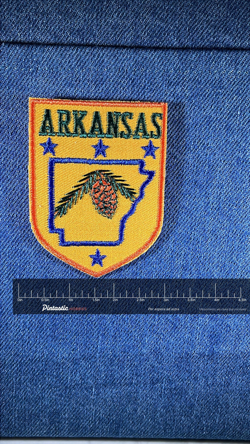 Arkansas Collectable Patch: Iron-On Yellow-Blue Shield - State Souvenir with ruler overlay for size reference