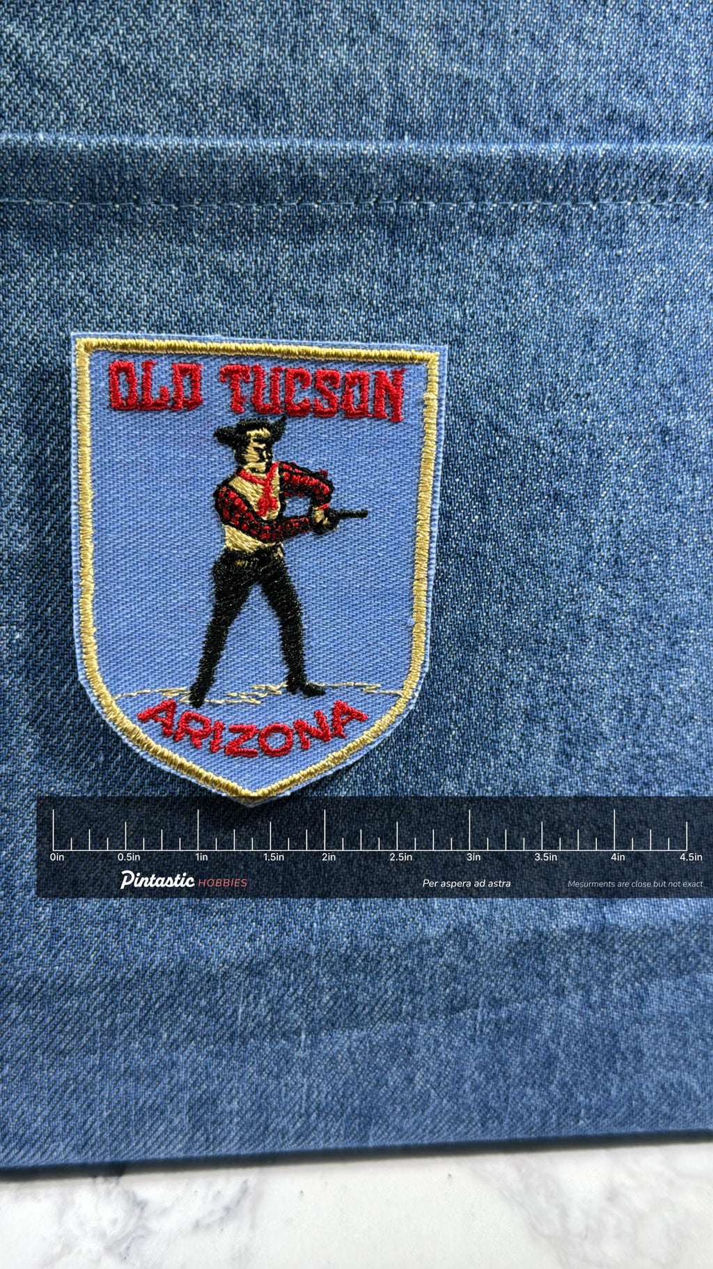 Old Tucson Collectable Patch: Sew-On Blue Shield - Western Theme Accessory with ruler overlay for size reference