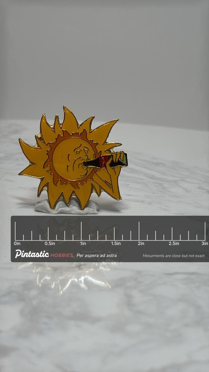 Sun Drinking Coca-Cola Enamel Pin: Retro Yellow & Blue - 90s Summer Accessory with ruler overlay for size reference