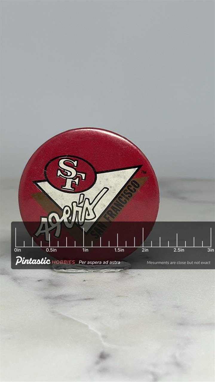 San Francisco 49ers Button Pin: Red & White Retro - Vintage Sports Accessory with ruler overlay for size reference