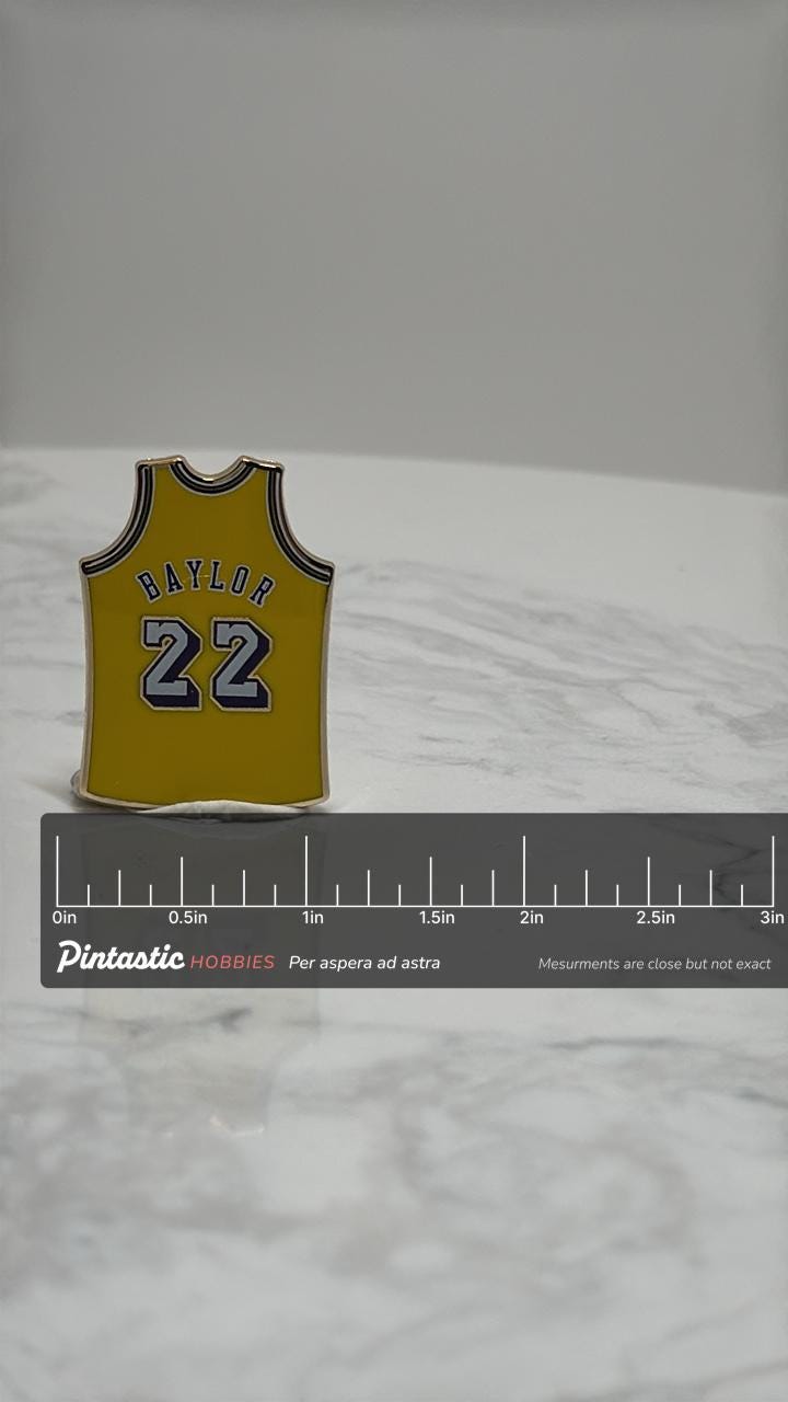 Elgin Baylor Jersey Pin: Yellow Enamel - Vintage NBA Accessory with ruler overlay for size reference