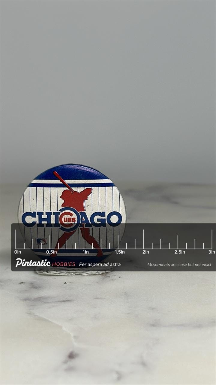 Chicago Cubs Baseball Pin: Red Silhouette Design - Vintage Sports Accessory with ruler overlay for size reference