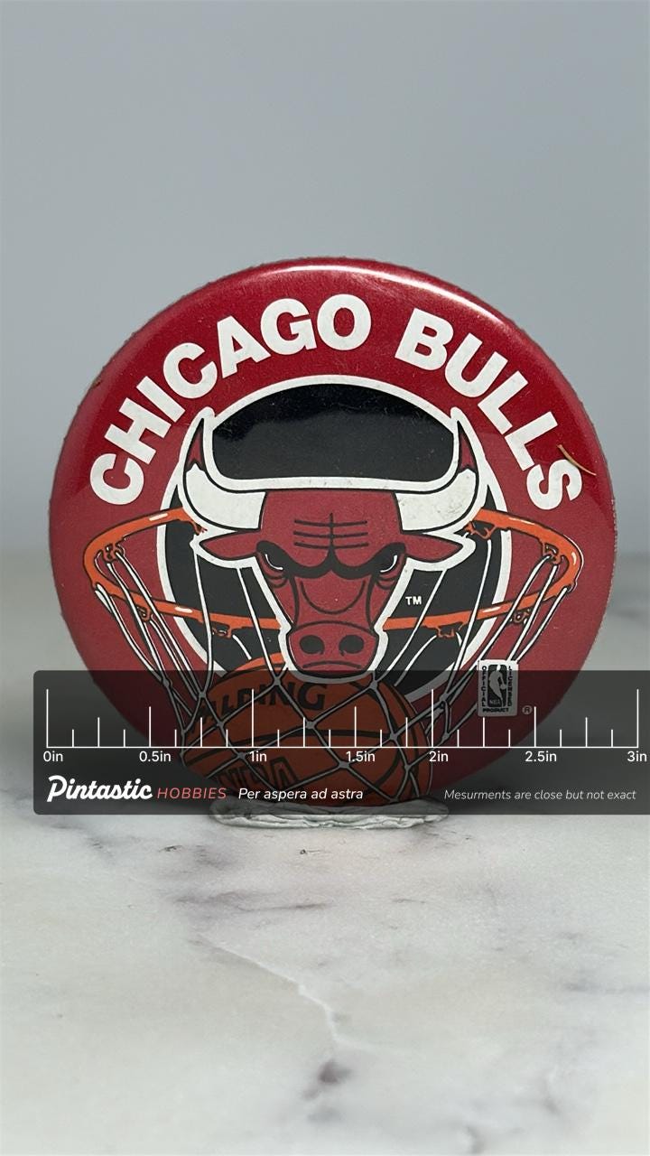 Chicago Bulls Button Pin: Red NBA Logo Design - 90s Sports Accessory with ruler overlay for size reference