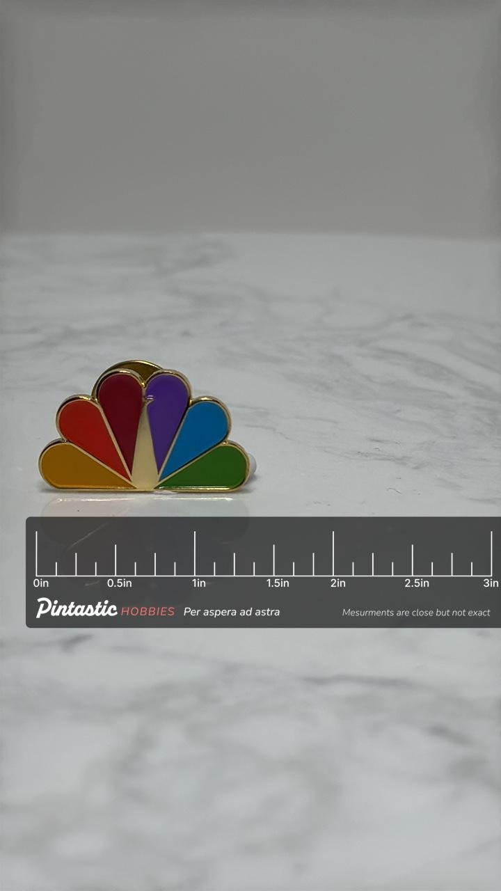 NBC Peacock Logo Pin: Rainbow Enamel - Retro TV Accessory with ruler overlay for size reference