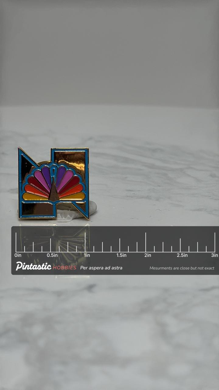 NBC N Shaped Pin: Multicolor Enamel - Vintage TV Accessory with ruler overlay for size reference