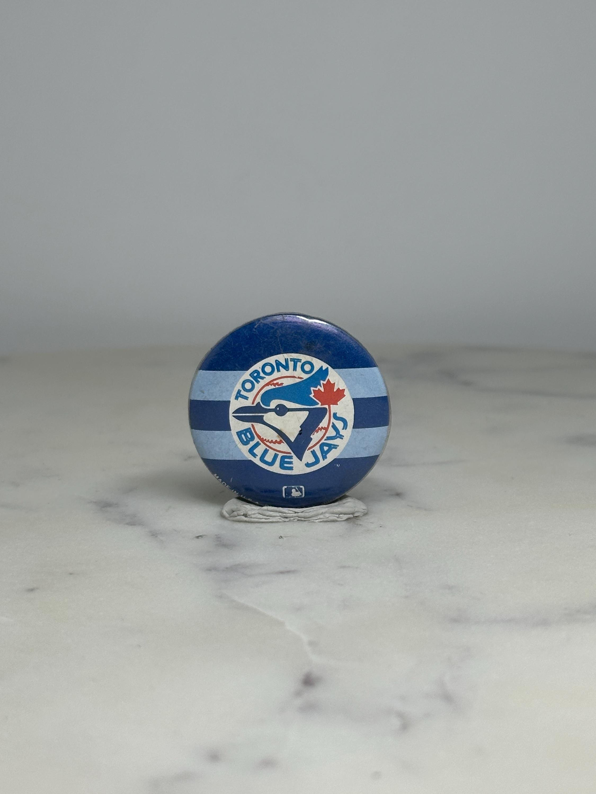 Toronto Blue Jays Button Pin: Blue & White Stripes - Vintage Sports Accessory