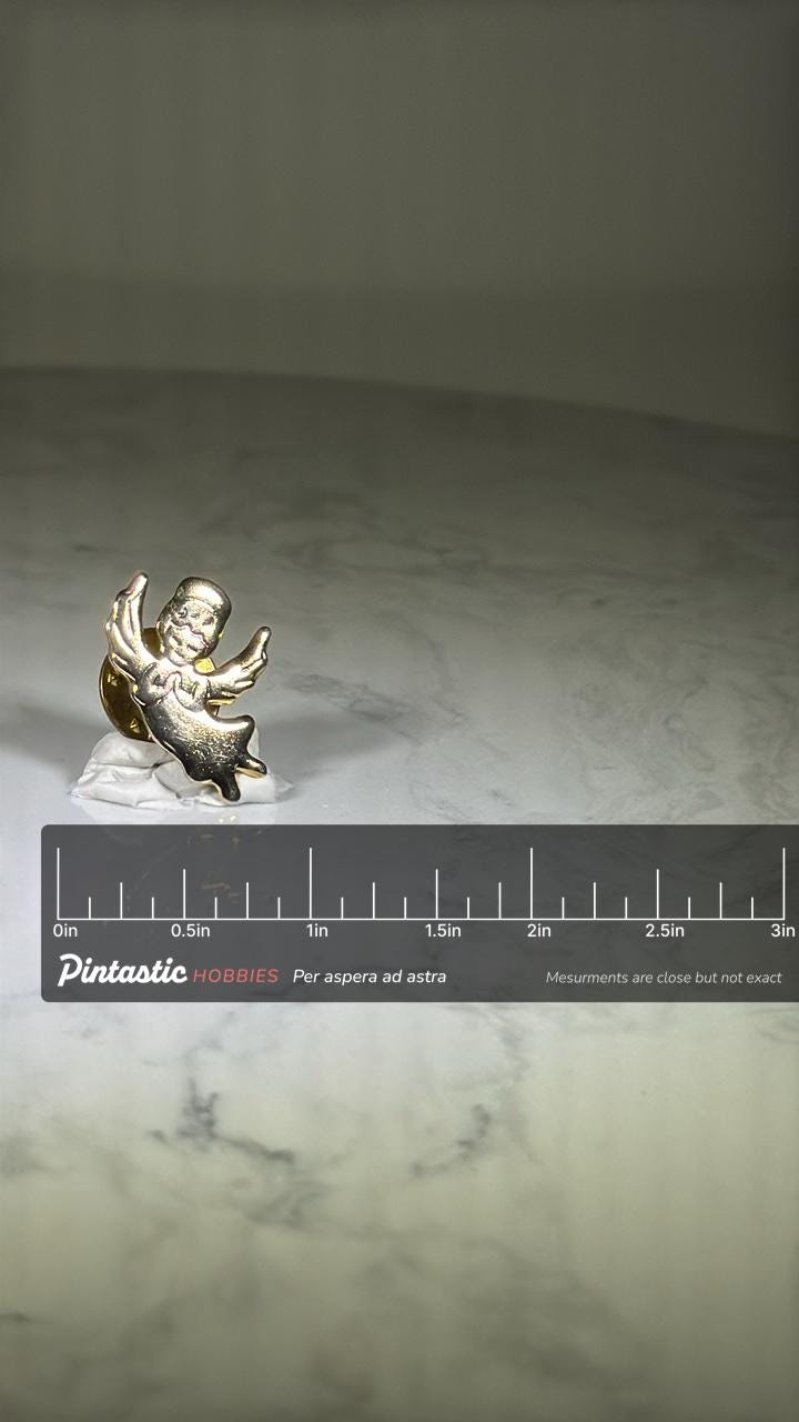 Flying Baby Angel Pin: Gold Tone Finish - Vintage Accessory with ruler overlay for size reference