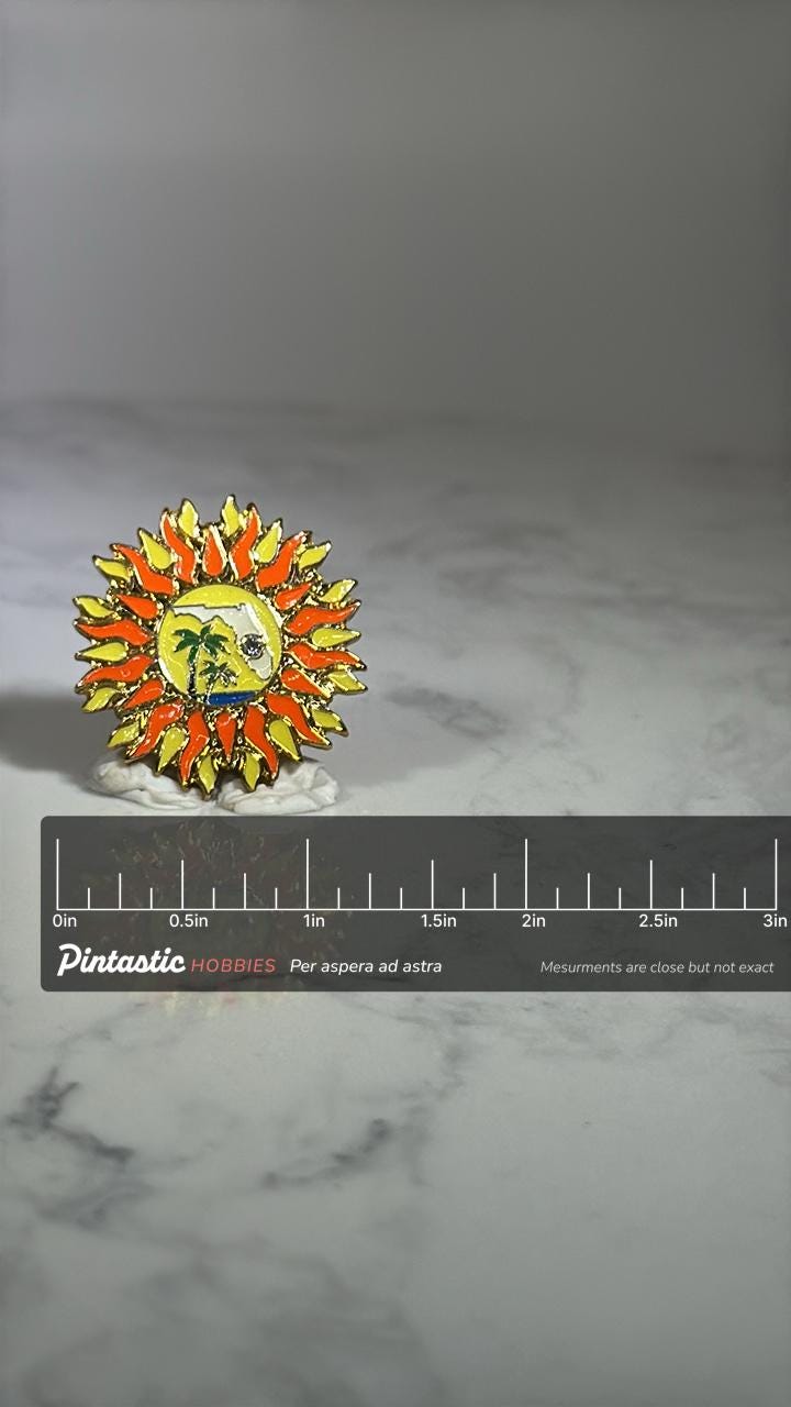Florida Tropical Sunburst Enamel Pin: Red Yellow Finish - Retro Vacation Accessory with ruler overlay for size reference