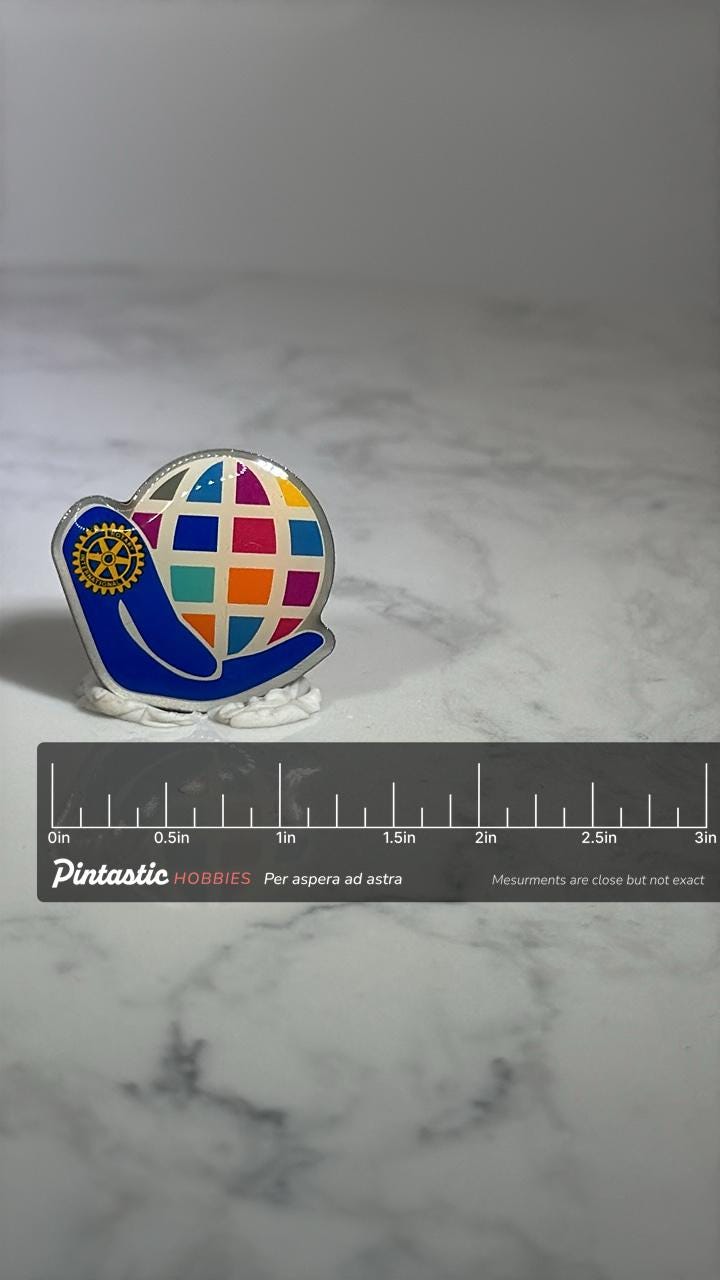 Rotary International Lapel Pin: Multicolor Globe Design - Global Unity Accessory with ruler overlay for size reference