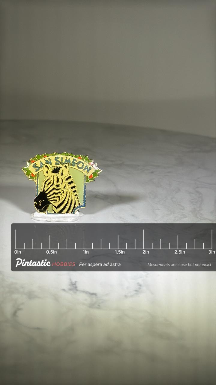 San Simeon Zebra Pin: Enamel Souvenir - Retro Travel Accessory with ruler overlay for size reference