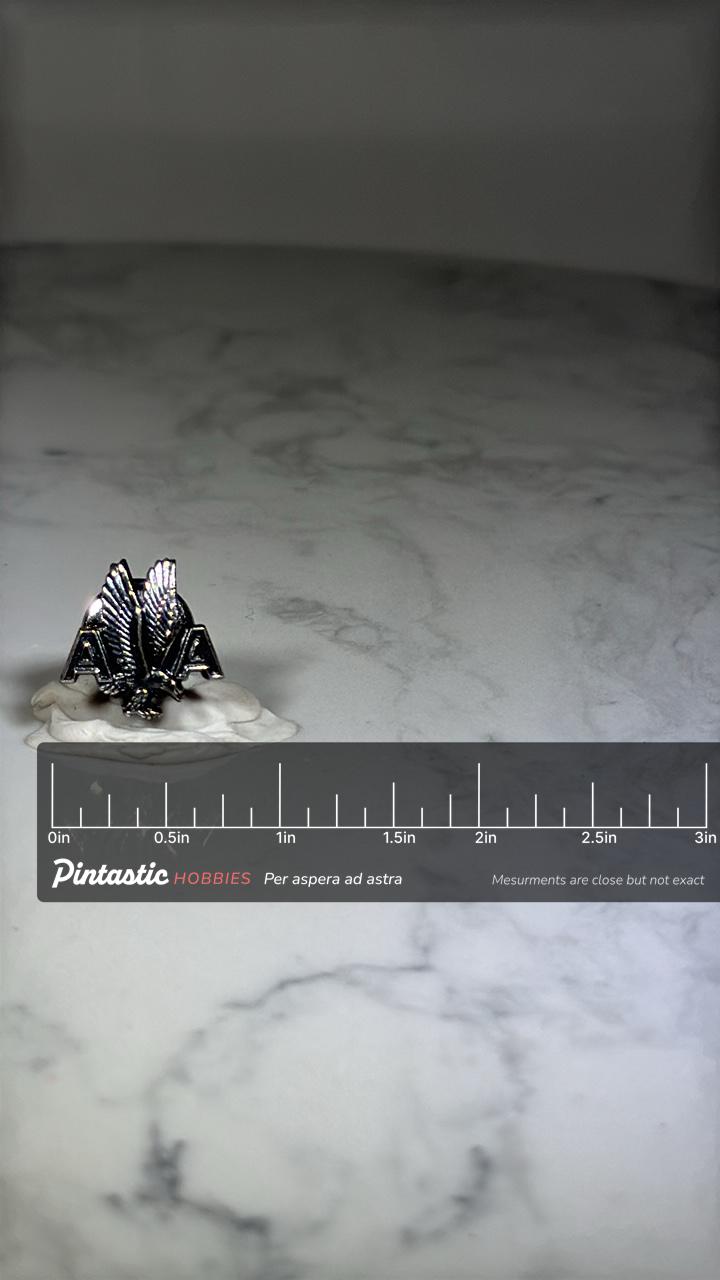 American Airlines Pin: Silver-Tone Wings Logo - Vintage Airline Accessory with ruler overlay for size reference