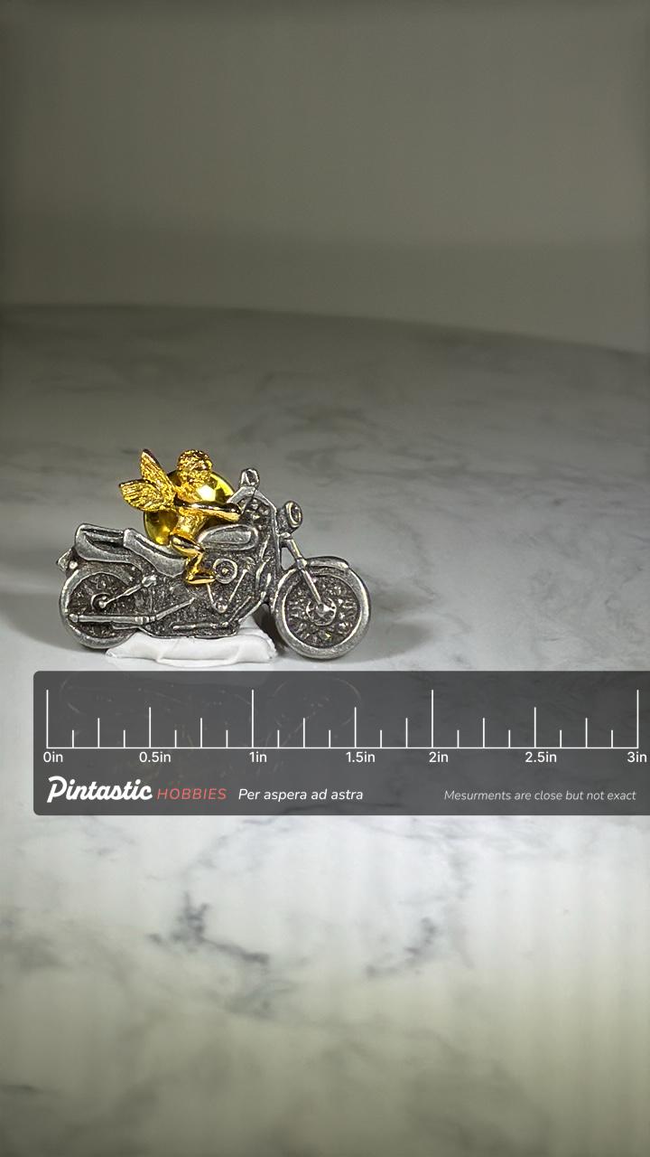 Angel Riding Motorcycle Pin: Silver & Gold Tone - Whimsical Vintage Accessory with ruler overlay for size reference