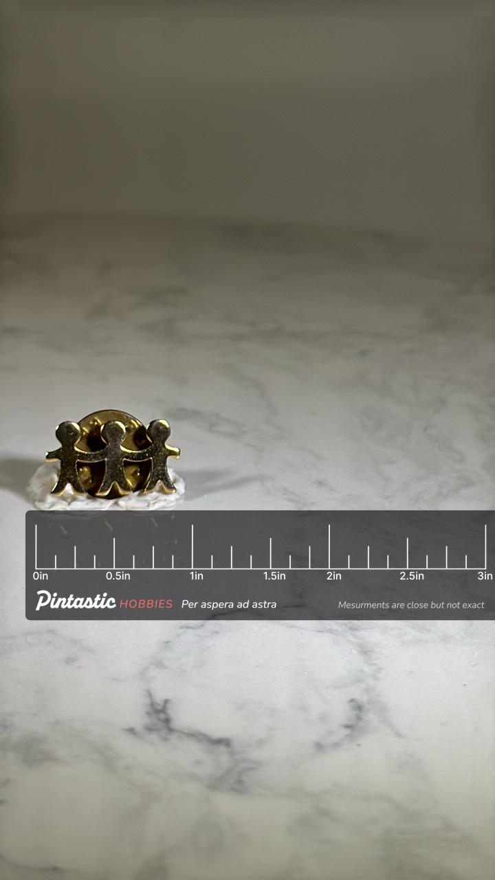 Children Holding Hands Pin: Gold Tone Metal - Vintage Friendship Accessory with ruler overlay for size reference