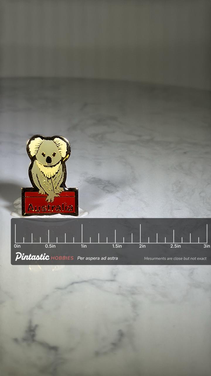 Koala Australia Souvenir Pin: Enamel Gold-Tone - Travel Collectible Accessory with ruler overlay for size reference