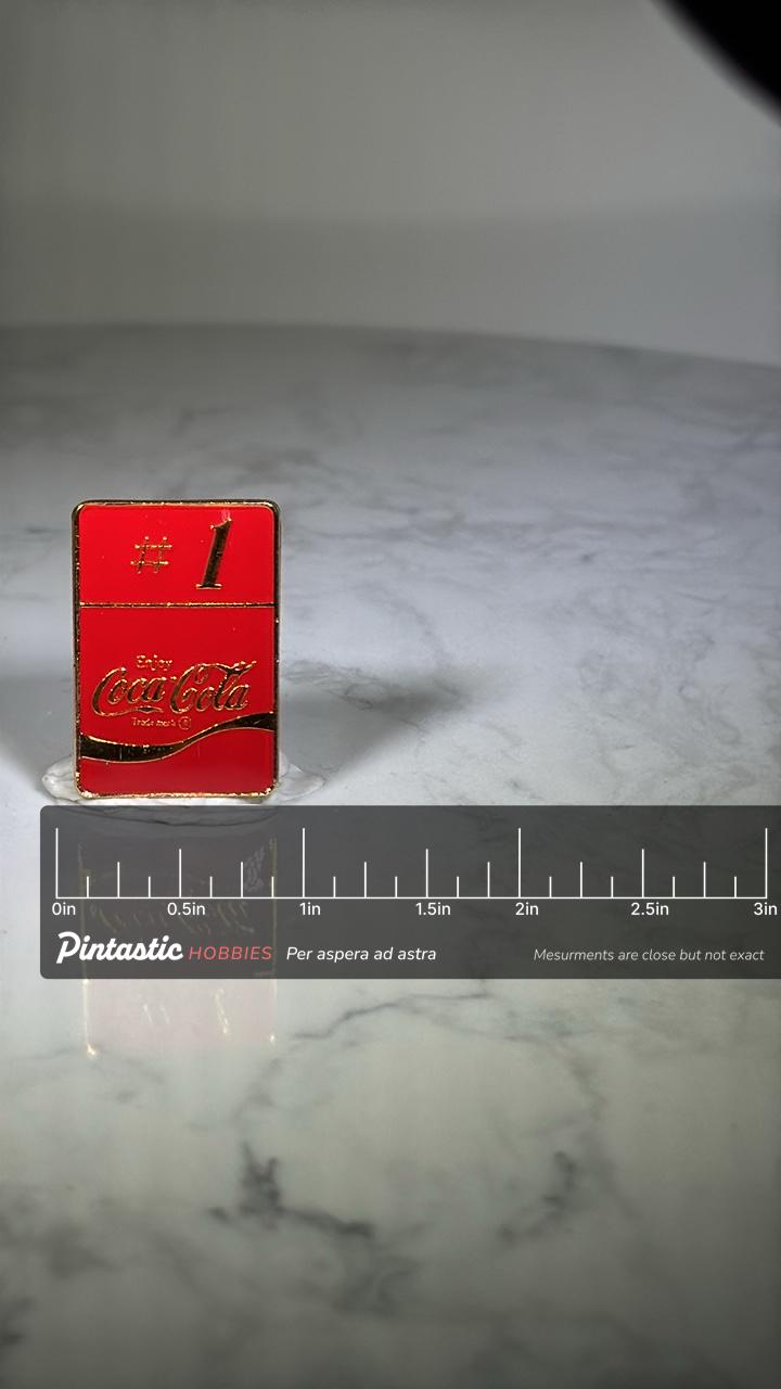 Coca-Cola Collector Pin: Red Enamel Gold Trim - Vintage Brand Accessory with ruler overlay for size reference