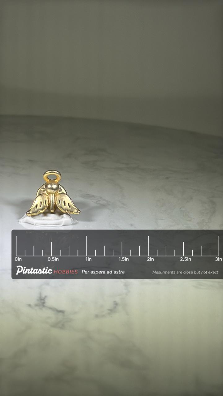 Angel Lapel Pin: Gold-Tone Metal Finish - Vintage Religious Accessory with ruler overlay for size reference